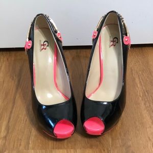 Super fun black and hot pink high heels